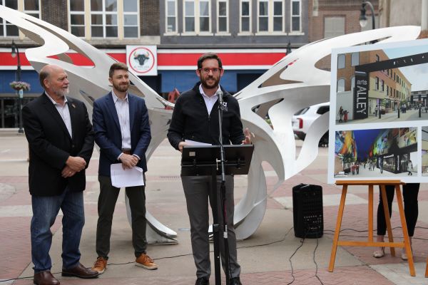 Speakers at Art Alley grant announcement