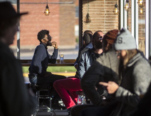 Guests meet and greet mingle at Wake Brewing