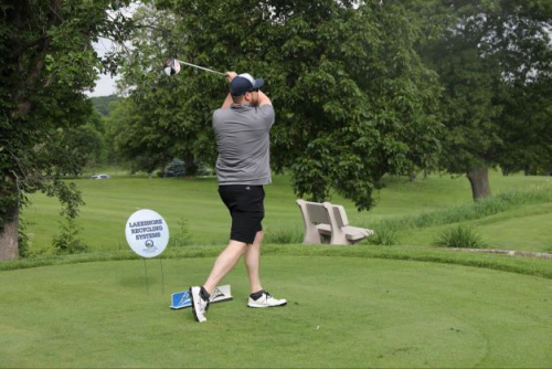 golfer taking a swing at Pinnacle Country Club