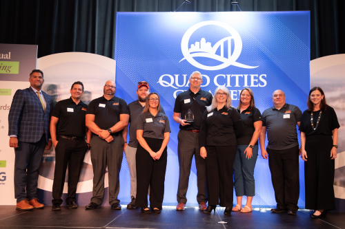 Business of the year accepting award at annual meeting