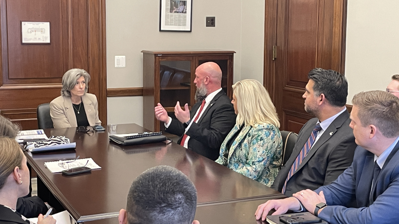 People talking around a table