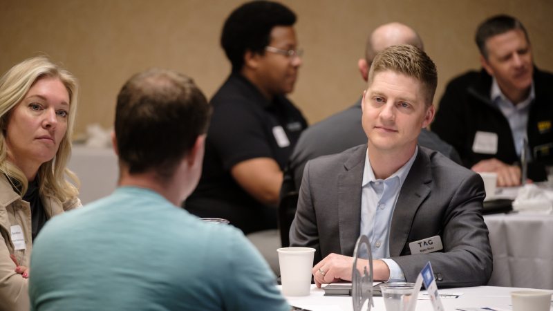 people networking at lunch