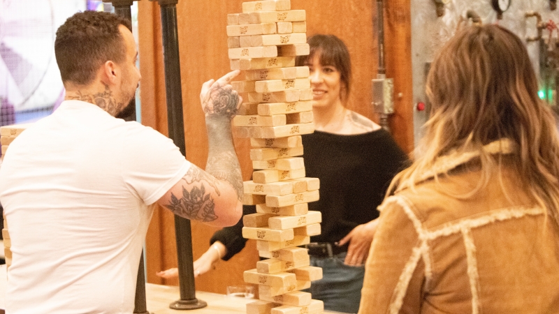 Playing oversized Jenga in Downtown Davenport - Quad Cities