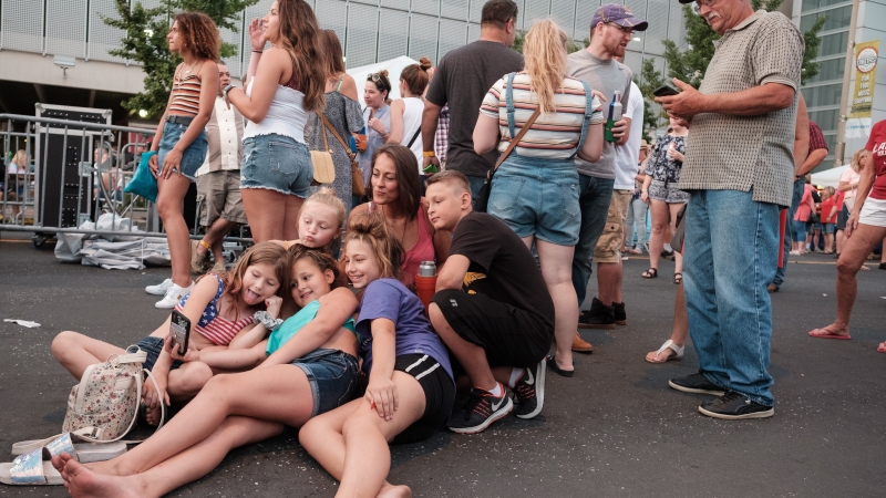 Family selfie at a festival - Quad Cities
