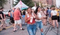 YPs enjoying a downtown festival - Quad Cities