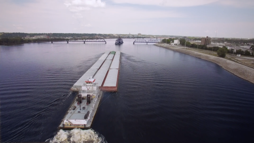 image of a barge moving on Mississippi River