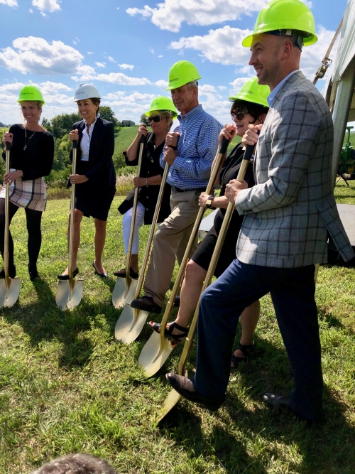 Governor Kim Reynolds, community leaders, and the Anderson family showcase that their Anderson 400 property is 'shovel-ready' as a green certified site